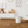 Herringbone floor Thede and Witte Oak slightly knotty brushed beveled oiled, installed in the children's room.